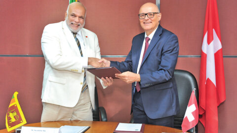 Ambassador for Switzerland in Sri Lanka Dominik Furgler, and Chairman EDB, Suresh de Mel, exchange the MoU